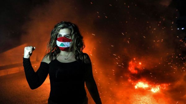 A Lebanese protester in a mask! 