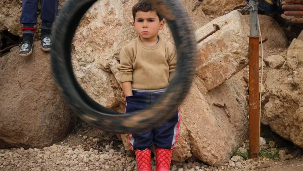 Three children killed and 15 injured as fire breaks out in crowded camp.