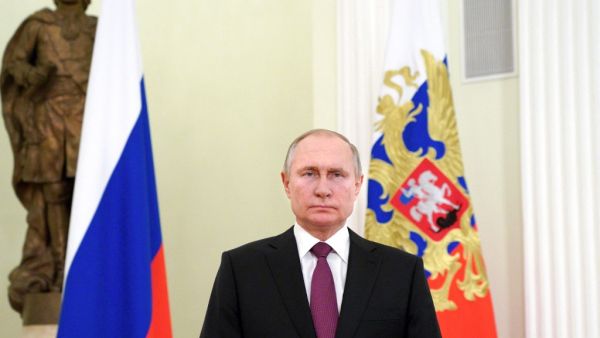 Putin signs into law bill to allow him two more terms as president