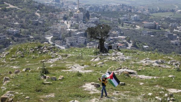 Palestinian man, identified as 42-year-old Osama Sidqi Mansour and his wife were traveling in their car.