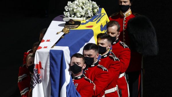 The coffin of Britain's Prince Philip, Duke of Edinburgh is laid onto a modified Land Rover Defender 