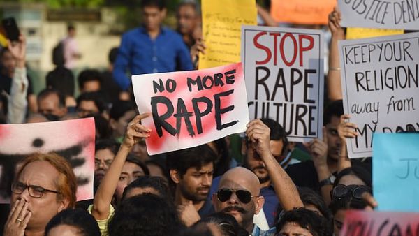 Girls, 14 and 15, are dragged to a forest and gang-raped