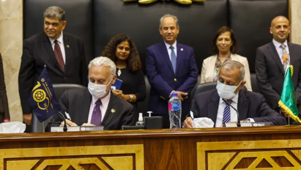 AUC Signs MOU With AASTMT And Strategic Partnership Agreement With AIU
