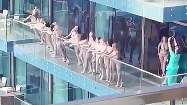 40 Women Pose Naked on a Balcony 