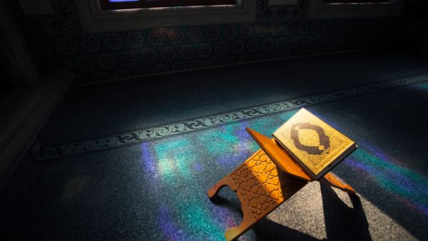 Quran - holy book of muslims, scene in the mosque at Ramadan time