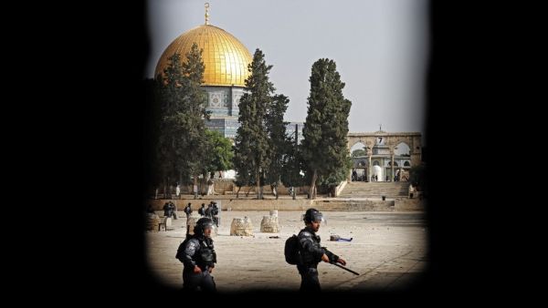 Israeli security forces amid clashes with Palestinians at Jerusalem's Al-Aqsa mosque compound on May 10, 2021, as a planned march marking Israel's 1967 takeover of the holy city threatened to further inflame tensions