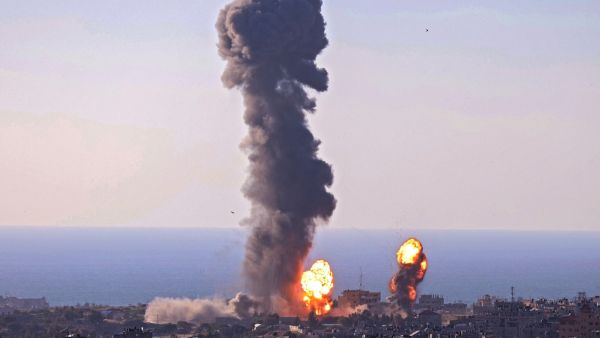 Smoke billows following an Israeli air strike in Rafah in the southern Gaza 