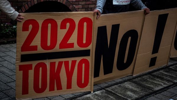 People take part in a protest against the hosting of the 2020 Tokyo Olympic Games in Tokyo 