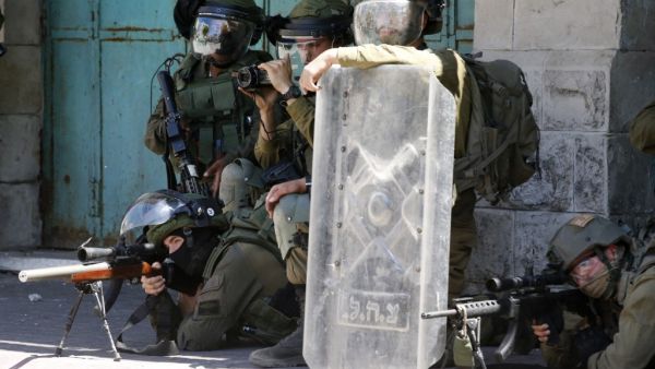 Israeli forces shoot dead Palestinian woman in al-Khalil.
