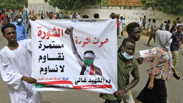 Sudanese protest on second anniversary of massacre in front of army headquarters