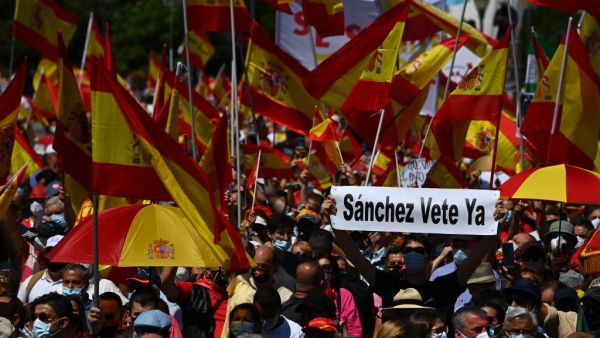 Thousands protest against pardoning detained Catalan leaders  in Madrid.