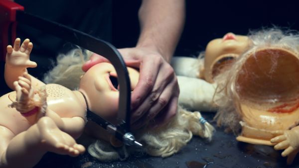 male hands cut off the head 