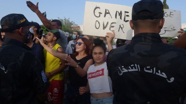 clashes erupted between the supporters and the opponents of the Tunisian president Kais Saied