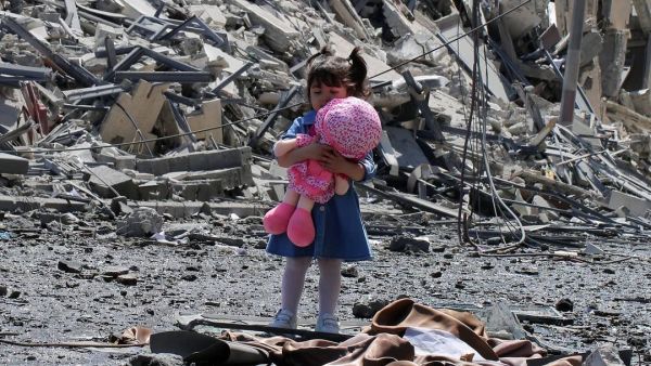 Child Celine from Gaza received the Eid with her doll in the rubble of the bombed house 