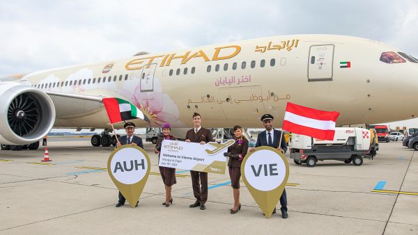 Etihad Airways cabin crew give passengers a warm welcome onto the first Etihad Airways service to Vienna on 18 July 2021 Etihad Launches 65th Destination With First Flight To Vienna