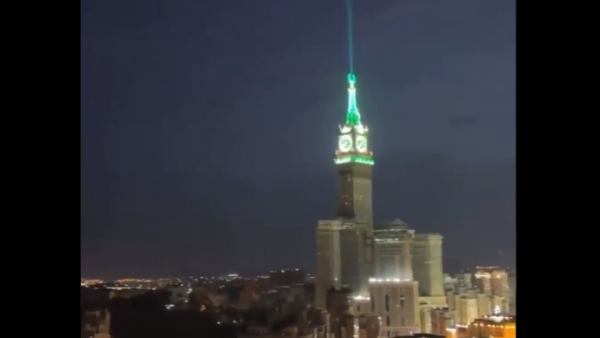 Makkah Royal Clock Tower in Saudi Arabia beaming light into the sky