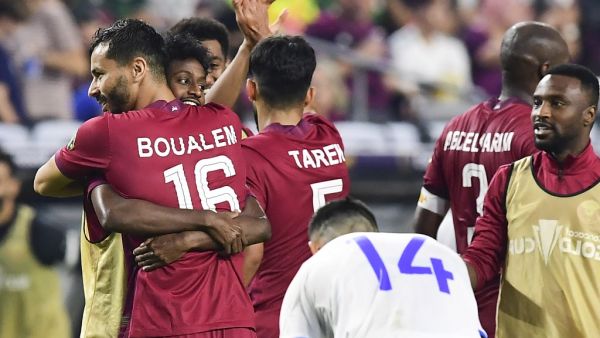 Qatar's Khoukhi Boualem (L) celebrates with teammates after defeating El Salvador following the Concacaf Gold Cup quarter final footbal match between Qatar and El Salvador at State Farm stadium in Glendale, Arizona on July 24, 2021. (Photo: AFP)