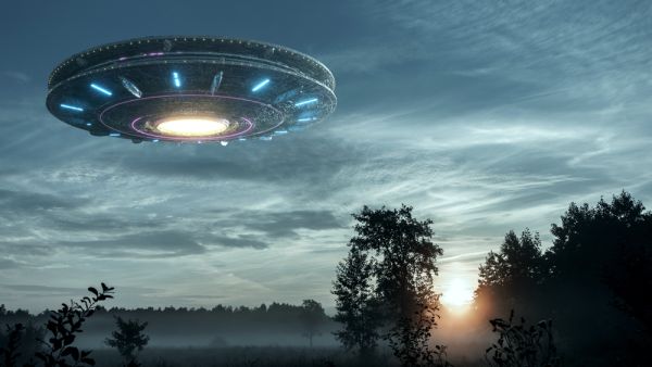 UFO, an alien plate hovering over the field