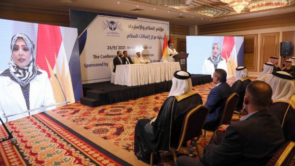 Iraqis listen to Sahr al-Ta'i at the Erbil in Iraq's Kurdistan autonomous region