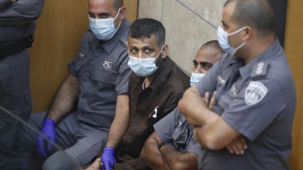Four Palestinians taken to court after managing to escape week ago