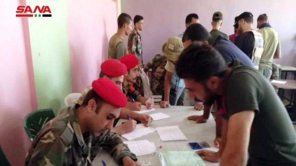 تسوية أوضاع المسلحين في درعا