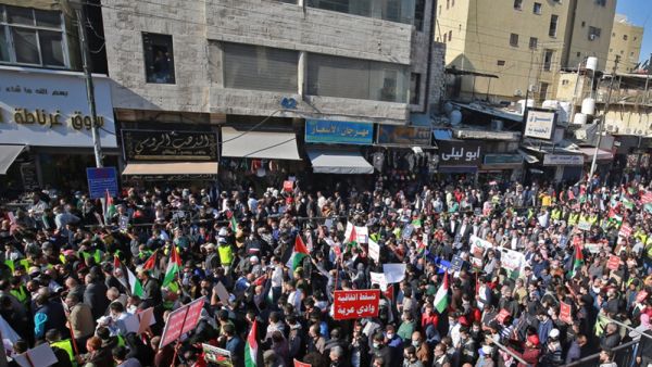Mass demonstrators in Amman