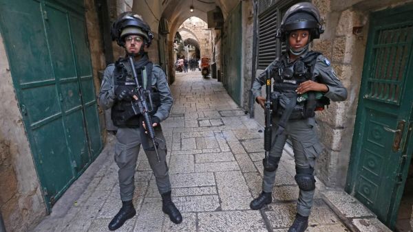 Israeli security forces stand guard in the alleys of Jerusalem's Old City
