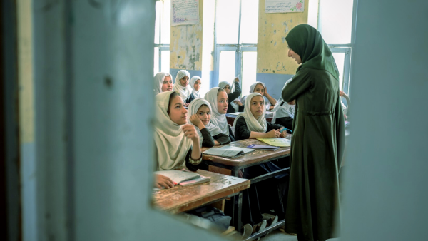 Afghan girls attend a class in a school in Kandahar