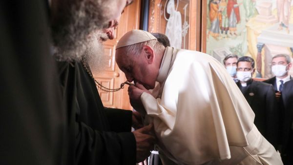 Pope Francis began a landmark trip to Greece with the first visit to Athens by a pontiff in two decades, aiming to improve historically fraught relations with the country's Orthodox Church and highlight the plight of refugees. (Photo by GEORGE VITSARAS / POOL / AFP) Pope Francis in Greece