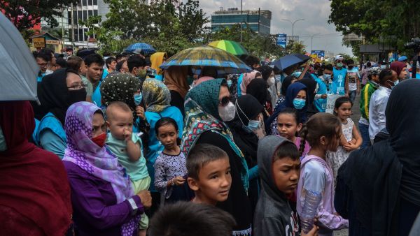 Desperate Afghan mother forced to giving up her daughter to pay off debt