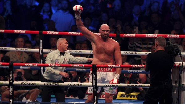  Britain's Tyson Fury (R) celebrates after knocking out Britain's Dillian Whyte in the sixth round to win their WBC heavyweight title fight at Wembley Stadium in west London, on April 23, 2022. Tyson Fury stopped British rival Dillian Whyte in the sixth round to retain his WBC heavyweight crown at a packed Wembley on Saturday. (Photo: AFP)