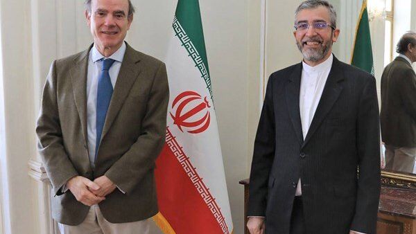 Mora (L) with Ali Bagheri