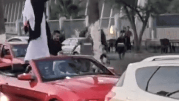 In Irbid: Man gives money away 