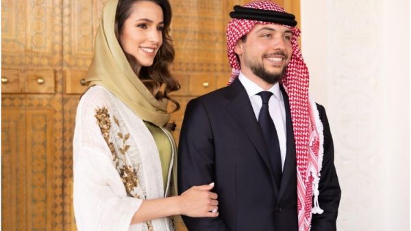 الأمير الحسين بن عبدالله والآنسة رجوة (المصدر: الديوان الملكي الأردني)