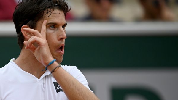 Austria's Dominic Thiem reacts during his men's singles match against Bolivia's Hugo Dellien at the Court Simonne-Mathieu on day one of the Roland-Garros Open tennis tournament in Paris on May 22, 2022. (Photo by Christophe ARCHAMBAULT / AFP)