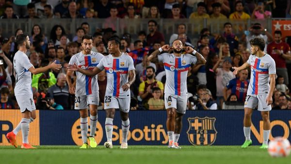 برشلونة يتحدى إشبيلية اليوم (المصدر: أ ف ب)