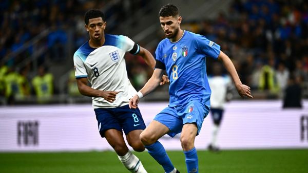 Italy's midfielder Jorginho (R) controls the ball as England's midfielder Jude Bellingham looks on during the UEFA Nations League's League A Group 3 match between Italy and England, at the San Siro Stadium in Milan on September 23, 2022. (Photo by Marco BERTORELLO / AFP)