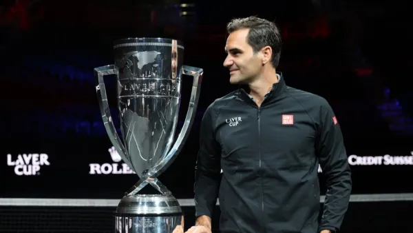 Roger Federer poses for a photograph with the Laver Cup Trophy after taking part in a live TV interview on CNBC at TD Garden on September 24, 2021 in Boston, Massachusetts. Clive Brunskill/Getty Images for Laver Cup/AFP (Photo by CLIVE BRUNSKILL / GETTY IMAGES NORTH AMERICA / Getty Images via AFP)