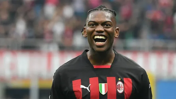 AC Milan's Portuguese forward Rafael Leao celebrates scoring his team's third goal during the Italian Serie A football match between AC Milan and Inter Milan at the San Siro stadium in Milan on September 3, 2022. (Photo by Isabella BONOTTO / AFP)