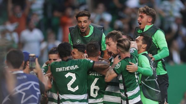 Sporting's players celebrate after scoring a goal during the UEFA Champions League, group D, first leg football match between Sporting Lisbon and Tottenham Hotspur at the Jose Alvalade stadium in Lisbon on September 13, 2022. (Photo by CARLOS COSTA / AFP)