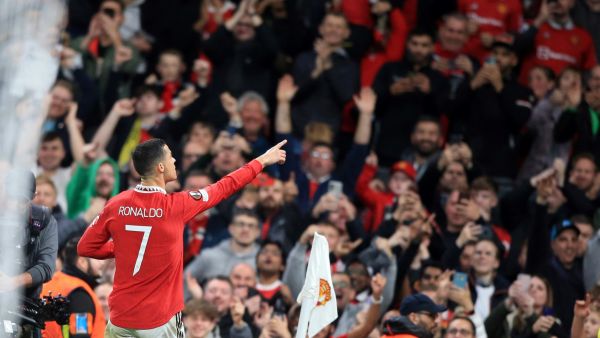 Manchester United's Portuguese striker Cristiano Ronaldo celebrates scoring the team's third goal during the UEFA Europa League Group E football match between Manchester United and Sheriff Tiraspol, at Old Trafford stadium, in Manchester, north-west England, on October 27, 2022. (Photo by Lindsey Parnaby / AFP)