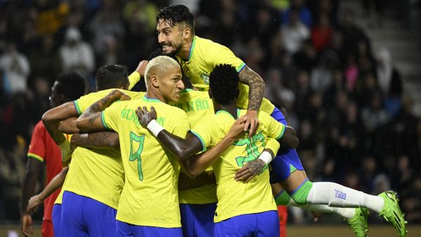 Brazil's team mates celebrate after defender Marquinhos scored a goal during the friendly football match between Brazil and Ghana at the Oceane Stadium in Le Havre, northwestern France on September 23, 2022. (Photo by Damien MEYER / AFP)