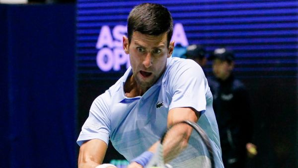 Serbia's Novak Djokovic returns a ball to Daniil Medvedev of Russia during their men's singles semi-final match at the Astana Open tennis tournament in Astana on October 8, 2022. (Photo by AFP)