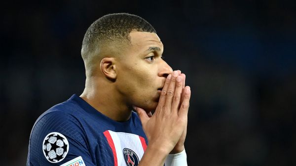 Paris Saint-Germain's French forward Kylian Mbappe reacts during the UEFA Champions League group H football match between Paris Saint-Germain (PSG) and SL Benfica, at The Parc des Princes Stadium, on October 11, 2022. (Photo by FRANCK FIFE / AFP)