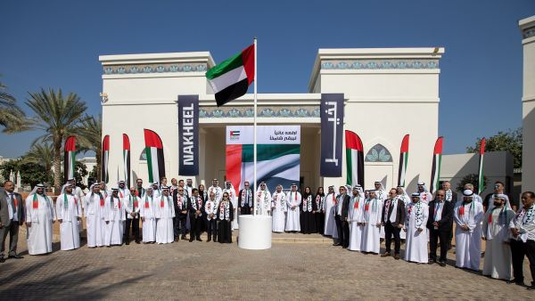 خلال الحدث "نخيل" ترفع علم الدولة احتفالاً بالذكرى العاشرة لـ"يوم العلم"