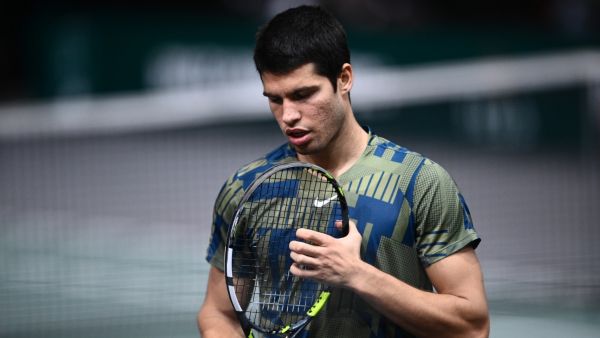 Spain's Carlos Alcaraz Garfia reacts during the men's singles quarter-final tennis match between Spain's Carlos Alcaraz Garfia and Denmark's Holger Rune on day 5 of the ATP World Tour Masters 1000 - Paris Masters (Paris Bercy) - indoor tennis tournament at The AccorHotels Arena in Paris on November 4, 2022. (Photo by Christophe ARCHAMBAULT / AFP)