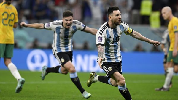 Argentina's forward #10 Lionel Messi (2ndR) celebrates with Argentina's forward #09 Julian Alvarez after he scored his team's first goal during the Qatar 2022 World Cup round of 16 football match between Argentina and Australia at the Ahmad Bin Ali Stadium in Al-Rayyan, west of Doha on December 3, 2022. (Photo by Alfredo ESTRELLA / AFP)