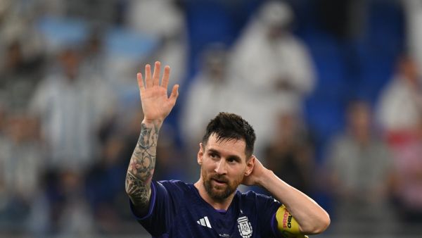 Argentina's forward #10 Lionel Messi waves to supporters after his team won the Qatar 2022 World Cup Group C football match between Poland and Argentina at Stadium 974 in Doha on November 30, 2022. (Photo by ANDREJ ISAKOVIC / AFP)
