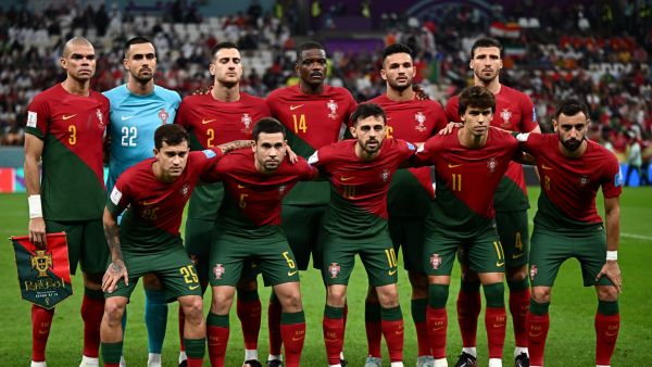 Players of Portugal pose for the team picture ahead of the Qatar 2022 World Cup round of 16 football match between Portugal and Switzerland at Lusail Stadium in Lusail, north of Doha on December 6, 2022. (Photo by Anne-Christine POUJOULAT / AFP)