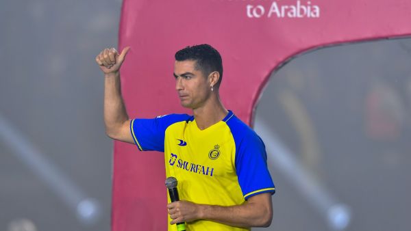 Cristiano Ronaldo greets the fans during his unveiling at the Mrsool Park Stadium in the Saudi capital Riyadh on January 3, 2023. (Photo by AFP)